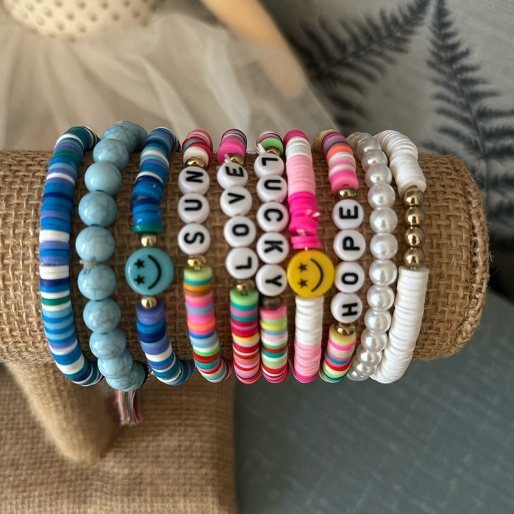 Stack bracelets with little words